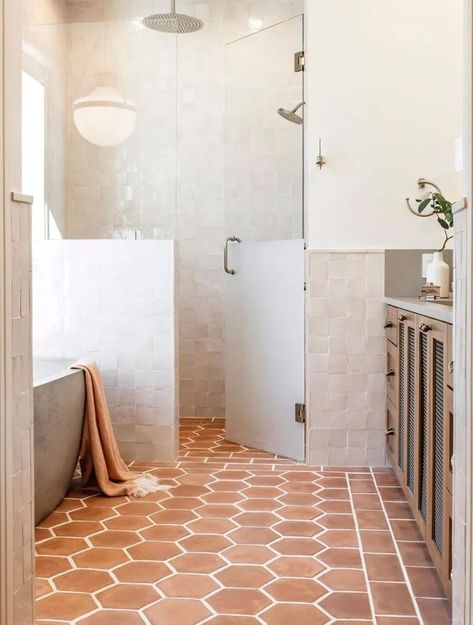 Hexagonal floor tile in burnt orange terra cotta tone. Inspiration from workyourcloset.com Terracotta Bathroom, Earthy Bathroom, Terracotta Floor Tiles, Master Bath Design, Terracotta Floor, Contemporary Shower, Basement Bathroom, Bathroom Floor Tiles, Bathroom Renos