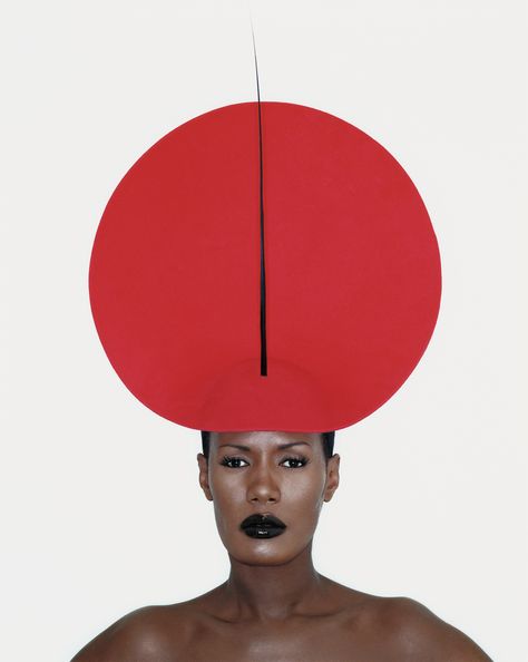 Grace Jones | Black women have always set the pace in fashion. Whether lending their beauty to the most renowned photographers in the world, lighting up stages and the big screen in covetable style, the world was watching and taking notes. These are the women whose fashionable influence can still be seen today. Jean Paul Goude, Philip Treacy Hats, Guy Bourdin, Philip Treacy, Grace Jones, Red Circle, Amazing Grace, Mad Hatter, Style Icon