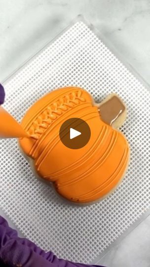 21K views · 1K reactions | I pulled this pumpkin cookie video from the archives for today, as you can probably tell from my lighting and purple gloves. It’s a cute sweater pumpkin technique though, so I thought it deserved an encore. Enjoy! 🧡

Cutter from @annclarkcookiecutters

#cookievideo #cookiedecoratingvideo #cookietutorial #pumpkincookies #fallbaking
#decoratedcookies
#royalicingcookies 
#cookieinspiration
#decoratedsugarcookies 
#cookiedecorating #cookiesofinstagram 
#rochestercookies | Mary Mansfield | theflourgardener · Original audio Sweater Pumpkin Cookies, Cookie Recipe Video, Purple Gloves, Pumpkin Cookie, Food Cookies, Sweater Pumpkins, Cookie Videos, Cookie Tutorials, Cookie Inspiration