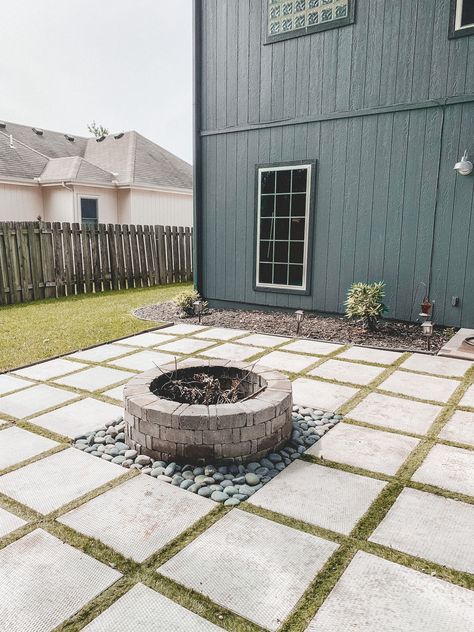 DIY patio with grass between pavers and a fire pit! Paver Fire Pit Diy, Patio With Pavers And Fire Pit, Paving Stone Fire Pit Area, Build A Fire Pit Area, Grill Paver Patio, Backyard Landscaping For Renters, Outdoor Patio With Pavers, Pavers Fire Pit Area, Cheap Paver Patio Ideas