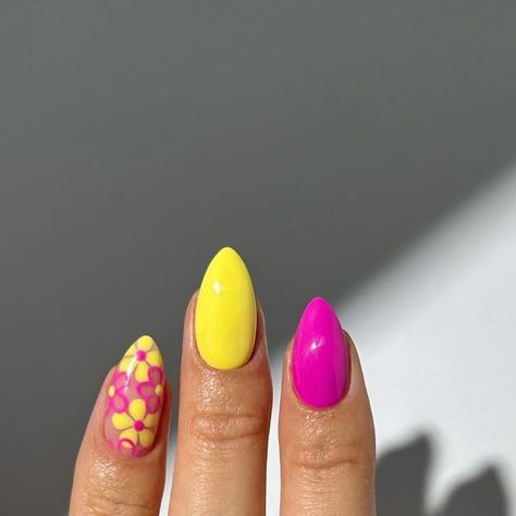 Marnie 🍒🌸🦋🌈✨ on Instagram: "pretty pink and yellow flower nails 🌺🌼🌸 one of my favourite colour combos, especially as the weather is finally starting to brighten up <3  ring is from @dovjewelry - code NAILOLOGIST10 for 10% off ✨  #nails #nailinspo #summernails #springnails #pinknails #nailart #prettynails #instanails #naildesign" Pink And Yellow Spring Nails, Orange Pink Yellow Nails, Pink And Yellow Nail Designs, Bright Pink And Yellow Nails, Pink And Yellow Flower Nails, Pink Purple Yellow Nails, Yellow Pink Nails, Bright Pink Flower Nails, Yellow Flower Nails