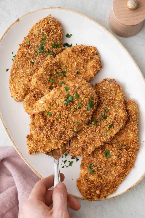 This Almond Crusted Chicken is crunchy and juicy, ready in 30 minutes with only a few ingredients, perfect for busy weeknight dinners! | Almond Crusted Chicken | Baked Almond Crusted Chicken | Almond Crusted Chicken Breasts Recipe | How to Make Almond Crusted Chicken | Easy Almond Crusted Chicken | Easy Chicken Recipes | Weeknight Chicken Dinner | Almond Baked Chicken, Almond Flour Crusted Chicken, Chicken Almondine, Feelgoodfoodie Recipes, Walnut Crusted Chicken, Carnivore Ideas, Pecan Crusted Chicken, Chicken Oven, Crusted Chicken Breast