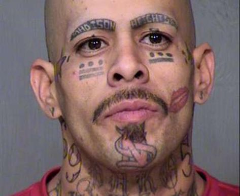 Angel Mendez has  tattoos of stars and lips, dots and dashes,  tear drops,  and the number 69 and other tattoos ringed his neck. Where Mendez’s eyebrows were are the words “Madison Heights.” Mendez, a 33-year-old with a lengthy rap sheet,  put up a bit of a fight when the Maricopa County deputies arrested him on charges including failure to appear in court. Bad Face Tattoos, Tattoo Gang, Blood Gang, Terrible Tattoos, Gang Tattoos, Face Tattoos For Women, Prison Tattoos, Epic Tattoo, Facial Tattoos