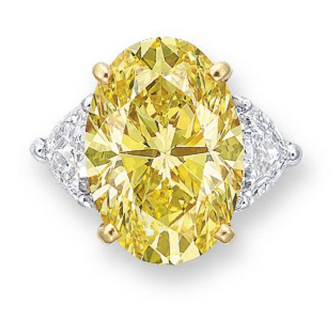 A COLOURED DIAMOND AND DIAMOND RING: Set with an oval-shaped fancy vivid yellow diamond, weighing approximately 7.28 carats, VVS1, flanked by pentagon-shaped diamonds, flanked on each side by an epaulette-shaped diamond, mounted in 18 karat yellow and white gold. Signed Cartier. Accompanied by report no. 3205649950 dated 20 August 2015 from the GIA Gemological Institute of America stating that the diamond is fancy vivid yellow colour, VVS1 clarity. Yellow Canary Diamond Ring, Luxury Yellow Jewelry With Single Cut Diamonds, Light Canary Diamond Rings, Canary Yellow Diamonds, Canary Yellow Diamond Ring 1stdibs, Canary Diamond, Diamond Ring Set, Yellow Colour, International Jewelry