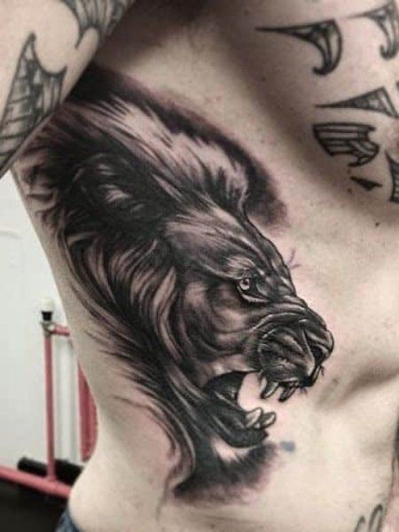 20 Cool Rib Tattoos for Men in 2021 - The Trend Spotter Cool Rib Tattoos, The Best Tattoos For Men, Mens Side Tattoos, Best Tattoos For Men, Rib Tattoo Quotes, Best Tattoo Ideas For Men, Flower Tattoo On Ribs, Rib Tattoos For Guys, Tattoos On Side Ribs