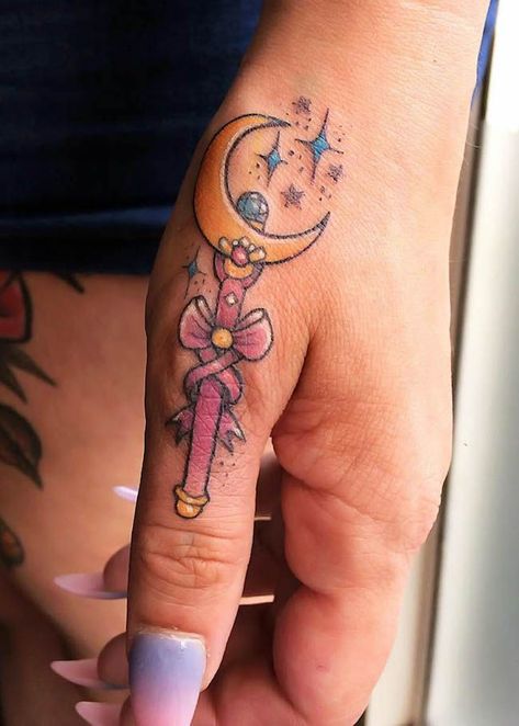 Moon Wand Tattoo, Sailor Moon Wand Tattoo, Finger Tattoos With Meaning, Sailor Moon Wand, Sailor Moon Wands, Thumb Tattoos, Wand Tattoo, Our Mindful Life, Sailor Moon Tattoo