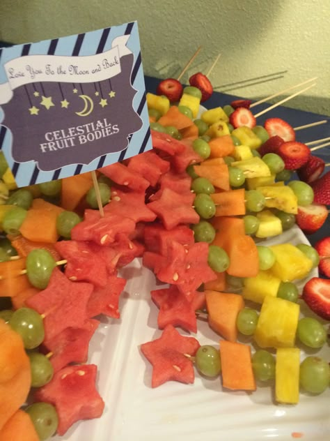 "Celestial fruit bodies" love you to the moon and back baby shower theme. Star shaped fruit skewers. Moon And Stars Fruit Tray, Love You To The Moon And Back Shower Theme, Meteor Shower Party Ideas, I Love You Two The Moon And Back Party, Moon And Stars Food Ideas, Space Themed Fruit, Celestial Food Ideas, Space Themed Fruit Tray, Star Themed Party Food