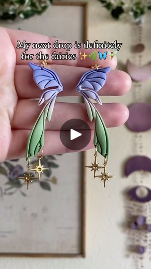 2.3K views · 676 reactions | The most magical, fairyland inspired collection of handmade, polymer clay earrings is headed to the site on 1/21 at 3pm PST!  Lots of enchanted, rainbow-y whimsy! 
.
.
.
#polymerclay #polymerclayearrings #jewelrymaking #polymerclaycreations #earringshandmade #fairywings #fairyworld #fairylights #fairycore #fairygarden #fairytales #fairyaesthetic #fairygardens #prettyearrings #flowerfairy #coquette #coquetteaesthetic #coquettecore #coquettegirl #whimsigoth #whimsigothic #whimsical #whimsigirl #whimsicalart | The Goode Karma Co. | Art Music · January Clay Clay, Fairy Aesthetic, Fairy Wings, Polymer Clay Creations, Flower Fairy, Fairy Land, Pretty Earrings, Whimsical Art, Handmade Polymer Clay