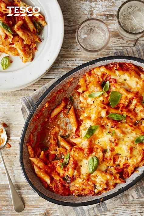 Keep it simple yet delicious with this easy pasta bake recipe. The perfect combination of penne pasta, hearty tomato sauce and oozing melted cheese, this recipe is sure to be a family favourite for any night of the week. | Tesco Sausage Recipes Crockpot, Crockpot Kielbasa, Kielbasa Sausage Recipes, Vegetarian Christmas Dinner, Tomato Pasta Bake, Pasta Bake Easy, Trending Food, Warm Potato Salads, Tomato Pasta Recipe