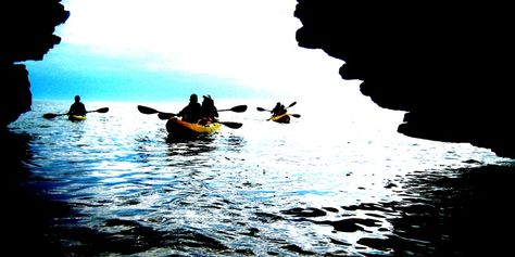 Door County Kayak Tour Great Cave Kayakers will encounter views of time worn bluffs and 1,000-year-old caves to Native American etched petro glyphs and lighthouses. - Wisconsin Vacation, Travel Wisconsin, Door County Wi, Door County Wisconsin, Wisconsin Travel, Kayak Tours, Kayak Trip, In Door, Door County