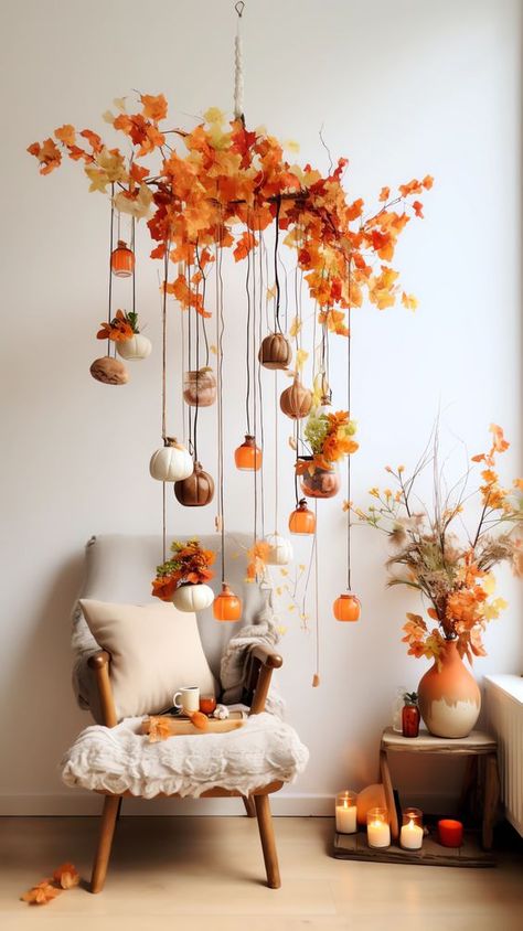 Get your front porch ready for fall festivities with a pair of planters surrounded by an abundance of mums and real or faux pumpkins and gourds. Mix in a few lanterns to add a welcoming glow to evening gatherings.#falldecor #autumndecor #fallvibes #pumpkinspice #cozyhome #fallleaves #homedecor #fallinspiration #fallcolors #harvestdecor #falltablescapes #fallwreath #fallmantel #fallcandles #fallcenterpiece #fallporchdecor #fallhomedecor #fallflorals #fallfarmhouse Fall Leaves Window Display, Storefront Fall Display, Diy Window Display Ideas, Autumn Cafe Decor, Fall Lobby Decor, Fall Decor Maximalist, Fall Cafe Decor, Fall Backdrops For Pictures Outdoor, Fall Retail Window Displays