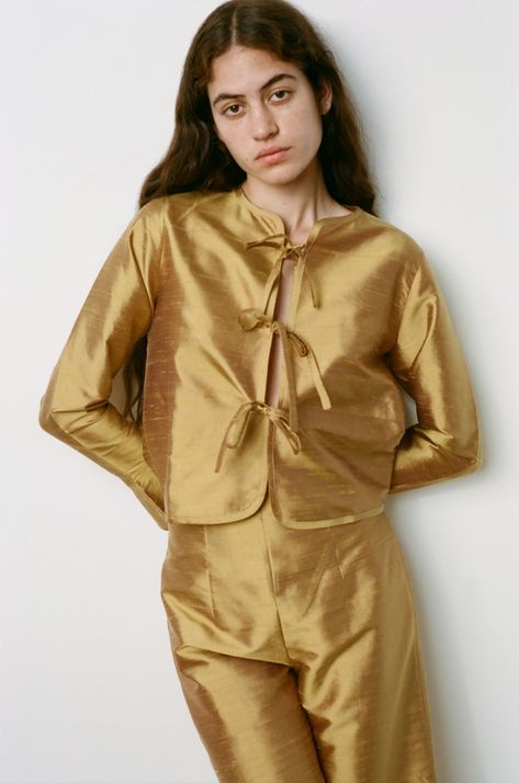 Lilian is an autumn adaptation of our Joni Top, crafted in dupion silk. With her tie-up front fastenings and playful waterfall sleeves, Lilian has an irresistible girlish charm we don’t think we can live without this season. 100% Dupion Silk Made in Suzhou, China Iris and Ayuol are both wearing size S Suzhou China, Dupion Silk, Velvet Lace, Suzhou, The Unexpected, Adaptation, Stretching, Wardrobe Staples, China