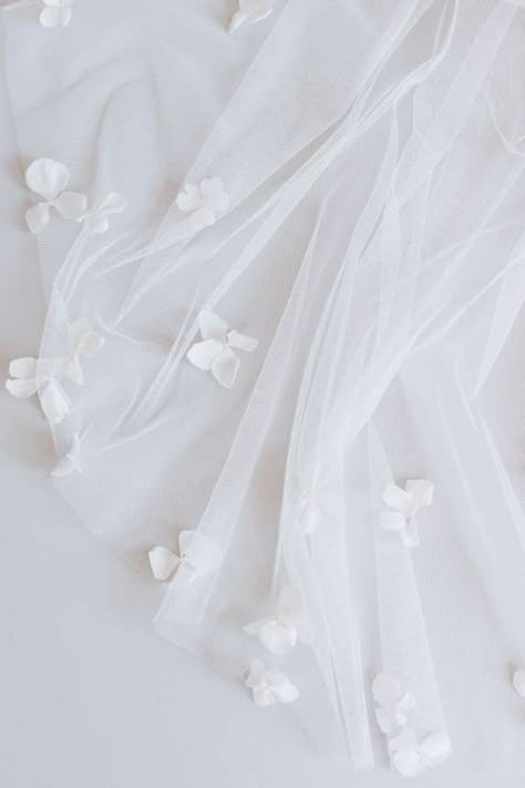 Bridal Asthetic, Bridal Background, Veil Aesthetic White, Elegant White Summer Veil, Elegant White Tulle Fabric With Floral Embroidery, White Wedding Aesthetic, Modern Ethereal Wedding, White Floral Tulle Fabric, Delicate White Tulle Fabric With Lace