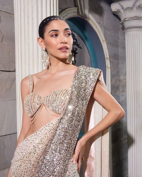 -SHIMMERVEIL- Where Every Moment Shimmers with Elegance Our ombre draped sequin saree, paired with a pearl-embroidered bralette blouse, is perfect for Gen Z. Bold yet elegant, it's a standout for taash parties and special occasions. With shimmering sequins and delicate pearl details, this look combines tradition with modern glam for an unforgettable statement. . . #Shimmerveil #WhiteElegance #WeddingGown #VeilPerfection #DayWedding #PriyankaJainFashion #genz #genzfashion #diwali2024 #diwal... Sequin Saree, White Elegance, Saree Blouse, Indian Wear, Bralette, Veil, Special Occasion, Wedding Gowns, Saree