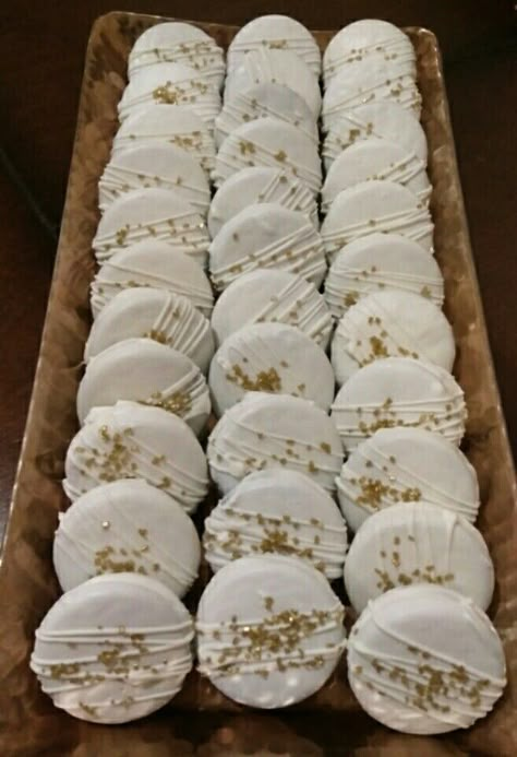 White And Gold Sweets Table, White Christmas Dessert Table, Chocolate Covered Oreos Wedding Dessert Tables, Dipped Oreos Wedding, Wedding Oreo Cookies, White And Gold Treats Dessert Tables, Bridal Shower Oreos, Baptism Dessert Table Ideas, White Wedding Desserts