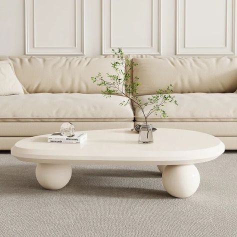 Ivy Bronx Khattab Coffee Table | Wayfair Pebble Coffee Table, White Round Coffee Table, Cream Table, Natural Cave, Stone Coffee Table, Brown Home Decor, Oval Coffee Tables, Nesting Coffee Tables, Solid Wood Coffee Table