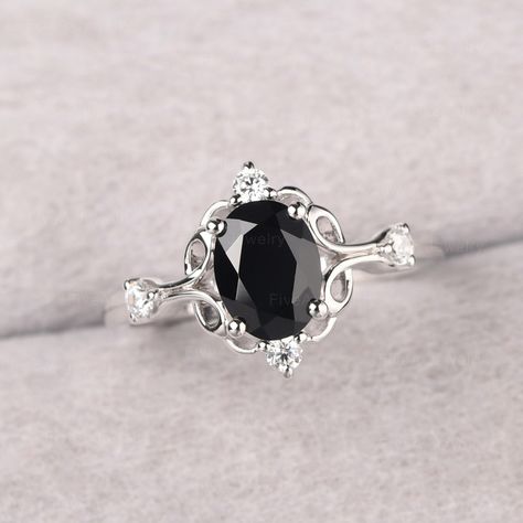 ◆ The ring is handcrafted from sterling silver and decorated with a dazzling 8*6 mm black spinel and CZs. It is suitable for engagement/anniversary/daily occasion. ◆ Production Description: Main stone Type: Natural Black Spinel Main Stone Shape: Oval Cut Main Stone Size: 8*6 mm(1.45ct) Side stone: CZ Metal: 925 Sterling silver - Other options available in the drop down menu ◆ Customization: √Free for Add Engraving √Other Metal Type Available √Other Gemstones & Shapes Available √Personalization R Gothic Promise Rings For Her, Black Diamond Engagement Ring Silver, Black And Silver Wedding Rings, Obsidian Engagement Ring, Christmas Wedding Ring, Ring With Black Stone, Black Sapphire Ring, Engagement Ring Black, Gothic Engagement Ring