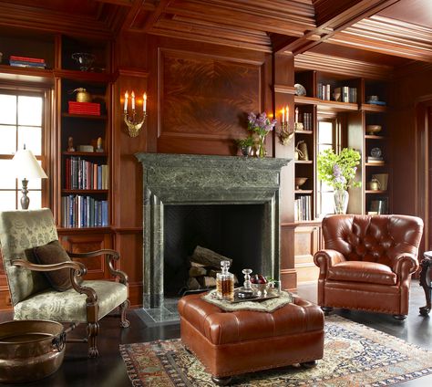 Mahogany wood paneling, built-in bookshelfs, and a grand marble fireplace create a intimate library in the Holly Circle house by Oak Hill Architects. Traditional Home Offices, Office With Fireplace, Wood Burning Fireplace Inserts, Traditional Home Office, Boston Design, Vintage Living Room, Traditional Living, Traditional Living Room, A Living Room