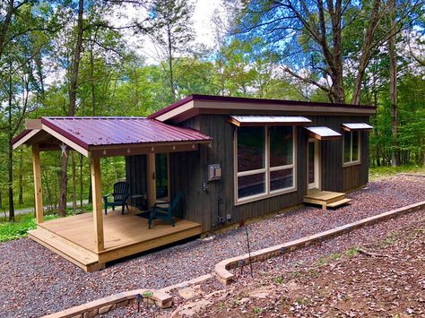 Tiny house with a red metal roof built in Maryland. Shed Roof Tiny House, Single Pitch Roof House, Metal Shed House, Single Pitch Roof, Shed Roof Cabin, Red Metal Roof, 12x24 Tiny House, Tiny Porch, Morton Homes