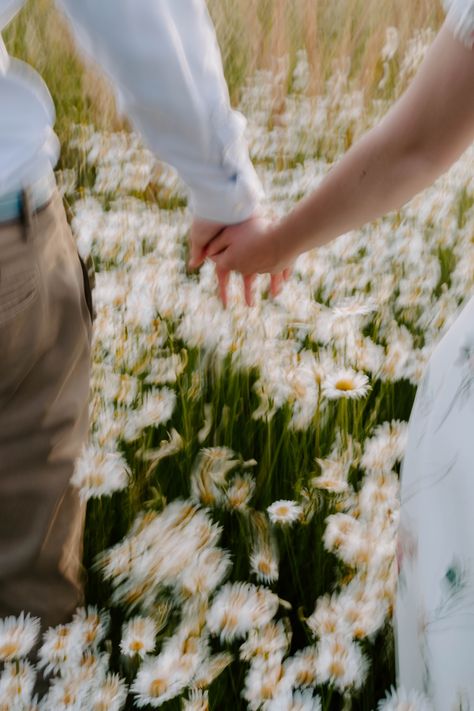 Couple In A Field Of Flowers, Couples In Flower Field, Countryside Couple Aesthetic, Couple In Field Photography, Wedding In Flower Field, Couple In Flower Field Aesthetic, Couple Giving Flowers, Couple Flower Field, Husband And Wife Aesthetic