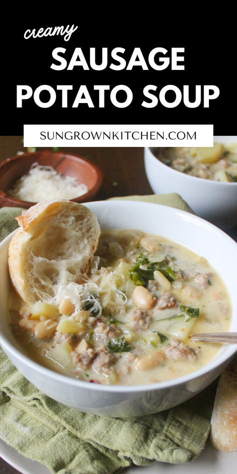 A bowl of creamy potato soup with Italian sausage, kale, white beans, Parmesan cheese and crusty bread. Kale Soup Recipes Sausage, White Bean Potato Soup, Potato Soup With Kale, Potato Sausage Soup, Creamed Soups, Kale And Potato Soup, Soup With Kale, Potato Sausage, Sausage Potato Soup