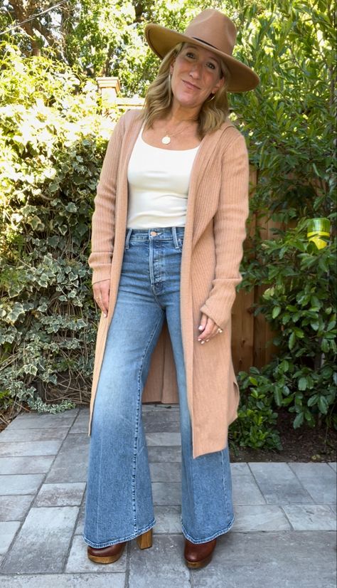 Mother Tomcat Roller jeans, Boden camel duster sweater, Target hat. Clogs And Flare Jeans, Flare Trousers Outfit, Outfit With Clogs, Hemming Jeans, Platform Clogs Shoes, Jeans And Hoodie, Duster Sweater, Trouser Outfit, Sweater Duster