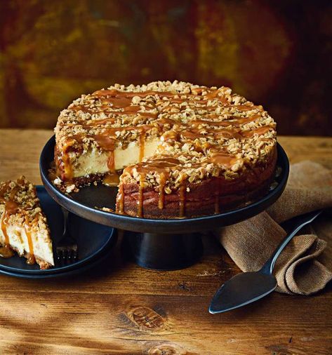 Apple crumble cheesecake recipe | Sainsbury`s Magazine Christmas Deserts Recipes, Apple Crumble Cheesecake, Christmas Desert, Crumble Cheesecake, Magazine Recipe, Cinnamon Biscuits, Winter Dessert Recipes, Vanilla Filling, Crumble Recipe