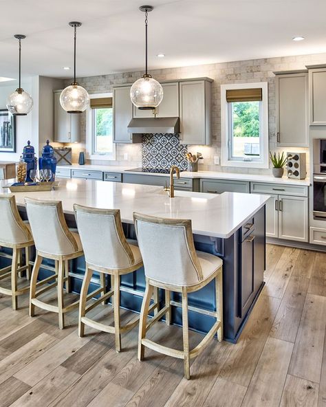 Everyone has their own priorities, of course, but at Schumacher Homes we find that a dream kitchen is virtually always high on every homeowner’s list, which is why we take great care creating home plans with spacious, inviting kitchens that families love to spend time in, whether entertaining, cooking for the family, or even just doing the dishes.  #SchumacherHomes #CustomHome #BuildHome #CustomBuilding #NewHomeDesign #HomeDesign #Kitchen #KitchenDesign Schumacher Homes, Curved Kitchen Island, Curved Kitchen, Doing The Dishes, Kitchen Custom, Living Room Renovation, Small Kitchen Decor, Perfect Kitchen, Custom Home Designs