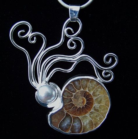 Fossil ammonite and pearl, set in sterling silver by artist Michael Kenney. Ammonite Jewelry, Ocean Inspired Jewelry, Simple Silver Jewelry, Fossil Jewelry, Soldering Jewelry, Silver Jewelry Design, Mens Silver Rings, Wire Work Jewelry, 925 Silver Jewelry