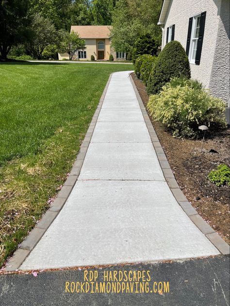 Concrete Walkway using paver as the border Pavers For Driveway Border, Concrete Patio With Paver Border, Concrete With Paver Border, Large Paver Sidewalk, Running Bond Paver Walkway, Paver Sidewalk, Concrete Sidewalk, Front Walkway Landscaping, Brick Border