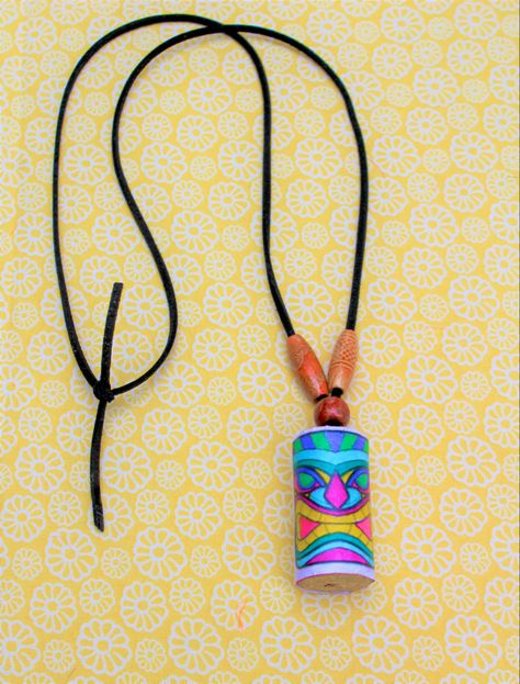 Tiki mask necklaces are the perfect craft for your luau! Tiki Crafts, Luau Crafts For Kids Activities, Tiki Craft, Polynesian Crafts Diy, Hawaiian Arts And Crafts, Tiki Masks Diy, Luau Crafts For Kids, Hawaiian Crafts For Kids, Pacific Islander Crafts For Kids