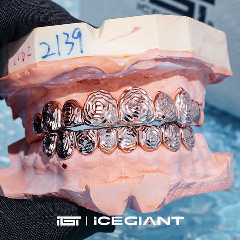 Custom perm cut rose gold grillz. 🌹 Here is a custom-made-to-order rose cut with authentic chosen material. ✔ This style is what you are looking for. 🤘Interested customers can run a quick check for similar pieces and DM us for serious custom ideas. 🔥🔥 . . . . #customgoldgrillz #10kgold #grillz #diamondgrillz  #UndergroundRap #WestcoastHipHop #grillzgodz #silvergrillz #customgrillz  #vvsgrillz #vvsdiamonds #custom #explorepage #diamondboyz  #theigtgrillz #icegiant #rosecut #permcut Rose Gold Grillz, Perm Cut, Teeth Accessories, Silver Grillz, Diamond Grillz, Ice Giant, Custom Grillz, Gold Grillz, Custom Ideas