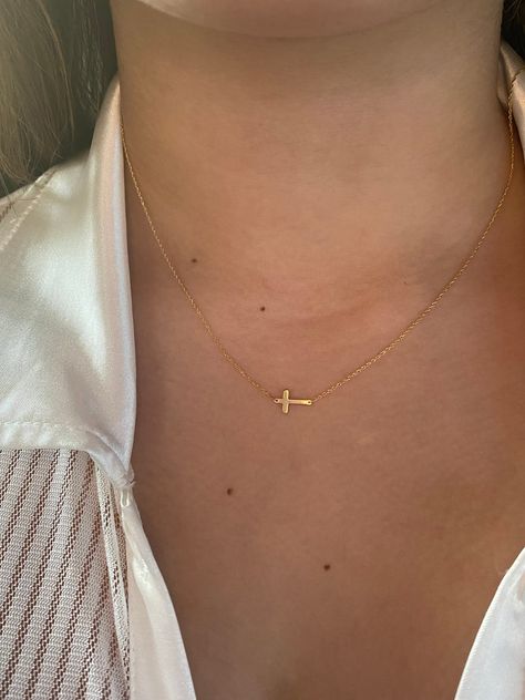 Small Cross Necklace / 14k Gold Sideways Cross Necklace / Mini Gold Cross Necklace / Baptism Gift / Communion / Confirmation / Confirmation    Free Shipping   within the USA Handmade beautiful minimalist 14k solid yellow gold sideways cross.  The chain is 14k solid gold which is adjustable with a spring lock.   The total length is 18 inches with a loop on 16 inches.  AS IT IS WITH THIS ITEM ALL MY PIECES ARE HAND MADE. AND I STAND BEHIND EVERY PIECE. SATISFACTION GUARANTEED. FIND OUT ABOUT OUR L Small Diamond Cross Necklace, Small Cross Necklace, Sideways Cross Necklace, Dainty Cross Necklace, Cross Necklace Sideways, Preppy Jewelry, Mini Gold, Gold Cross Necklace, Small Crosses