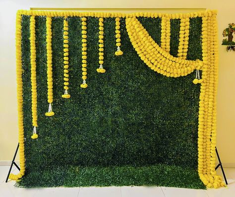 Contact for Booking:-8793526944/8149122803 Green Background Ganpati Decoration, Baby Shower Background Decorations, Haldi Decoration Ideas Simple, Sreemantham Backdrop, Simple Cradle Ceremony Decorations, Srimantham Decorations, Simple Haldi Decoration At Home, Srimantham Decoration At Home Simple, Mehndi Backdrop