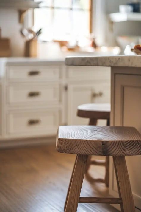 Wooden barstools at a kitchen island in a bright, airy kitchen. Wooden Stool Designs, Kitchen Island Stools, Wood Combinations, Farmhouse Rustic Kitchen, Farmhouse Bar Stools, Farmhouse Stools, Painted Stools, Island Stools, Rustic Kitchen Island