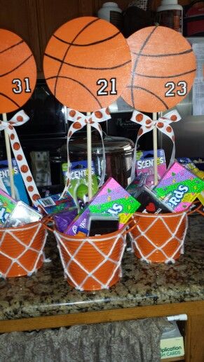 Basketball Buckets I made for our Sparks Basketball Gifts For Players Diy, Basketball Centerpieces Diy, Basketball Crafts For Team, Basketball Basket Ideas, Basketball Goodie Bag Ideas, Basketball Basket Gift Ideas, Basketball Banquet Centerpieces, Basketball Banquet Ideas, Basketball Centerpiece Ideas