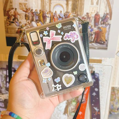 i love my @fujifilm_ca mini evo! you can print polaroids with knowing what they will look like! you can also store them in the camera using an sd card! . . . Follow @doraejou if you want to see more 🫶 #instax #fujifilm #camera #journal #diaries #camera #cameras #fujifilm_xseries #fujifilmminievo #minievo #studygram #desksetup #deskgram #deskgoals #deskspace #deskorganization #ugc #ugccreator #ugccommunity #ugcexample #ugccontent #ugccreators Polaroid Camera Decoration, Instax Evo Mini, Mini Evo Fujifilm, Instax Mini Aesthetic, Fujifilm Instax Mini Ideas, Instax Camera Aesthetic, Instax Evo, Fujifilm Instax Mini Evo, Instax Mini Ideas