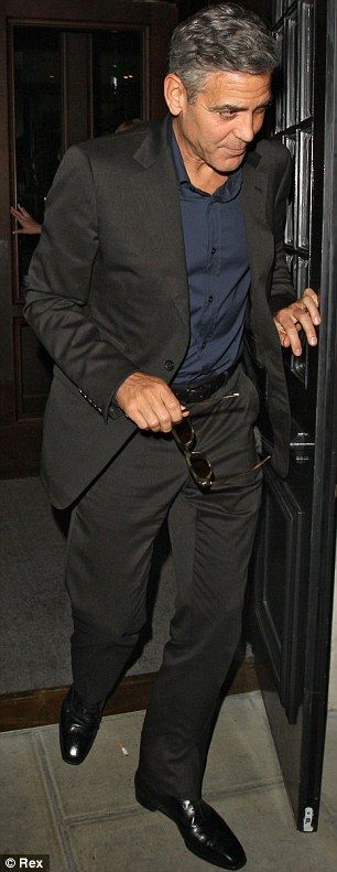 Suited up: George looked dapper in a dark suit and navy blue shirt as he left the restaurant Black Suit Navy Shirt, Black Suit With Blue Shirt, Navy Suit Black Shirt, Black Suit Blue Shirt, Winter Groom, Amal Alamuddin, Stylish Mens Suits, Dark Blue Shirt, Black Suit Men