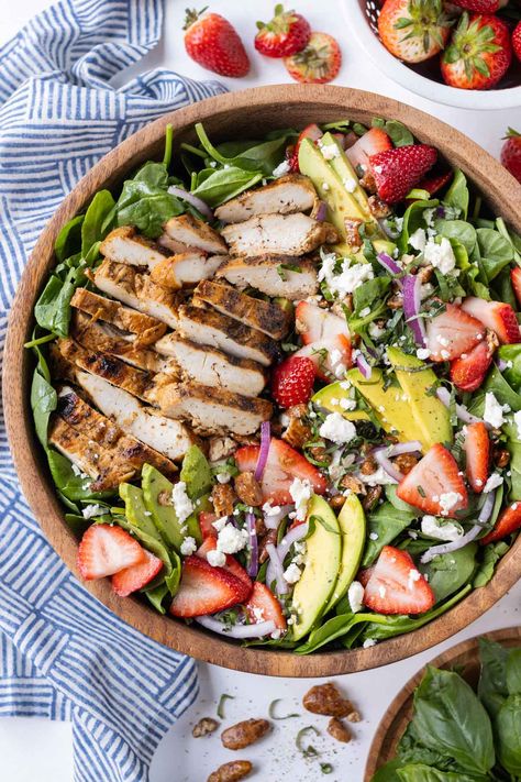 This Strawberry Spinach Salad with Grilled Chicken is one of those dishes that hits every tastebud in your mouth! Juicy fresh strawberries, creamy avocado, salty feta cheese crumbles, sweet candied pecans, and a tangy homemade balsamic dressing are all balanced out with some protein-packed grilled chicken. It will no doubt be the talk of the town at your next summer BBQ or get-together. Strawberry Chicken, Balsamic Dressing Recipe, Salad With Strawberries, Salad With Spinach, Creamy Balsamic Dressing, Strawberry Chicken Salad, Spinach Salad With Chicken, Strawberry Spinach, Spinach Strawberry Salad