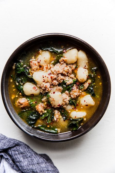 It’s hard to say what people are more crazy for—Trader Joe’s cauliflower gnocchi, or the Olive Garden’s ‘Zuppa Toscana’. And really, why pick just one? Gnocchi Recipes Soup, Cauliflower Gnocchi, Gluten Free Gnocchi, Zuppa Toscana Soup, Bruschetta Toppings, Toscana Soup, The Modern Proper, Modern Proper, Vegan Cauliflower