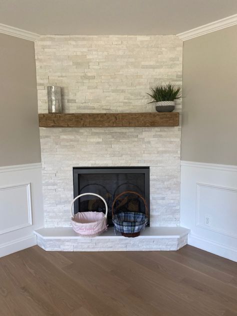 Fireplaces With Raised Hearth, Stone Fireplace On Angled Wall, Flush Corner Fireplace, How To Build A Corner Fireplace, Corner Fireplace With Mantle, Electric Fireplace Ideas Living Room, Corner Fireplace Accent Wall, Corner Fireplace Ideas Farmhouse, Angled Fireplace Living Room