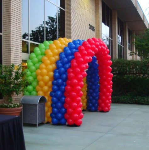 Four-level primary-colors balloon-arch "tunnel"!  www.partyfiestadecor.com Balloon Tunnel, Balloon Archway, Dumbo Birthday Party, Ballon Decoration, Gate Decoration, Balloon Arches, First Birthday Decorations, Rainbow Balloons, Birthday Party Balloon