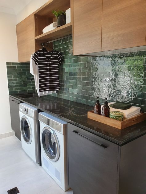 Beautiful green tiles with black and timber laundry under bench washing machine Laundry Green Tiles, Green And Timber Laundry, Green Backsplash Laundry Room, Green Tile Laundry Room, Laundry Tiles Backsplash, Green Tile Laundry, Midcentury Modern Laundry, Timber Laundry, Green Laundry Room Ideas