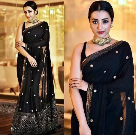 Shop Designer Partywear Black Saree With Golden Border Online at YOYO Fashion.  To Place Order , Call Or Whatsapp us on +91 8000588688  #yoyofashion #sareeofinstragram #sareelovers #sareefashion #sarees #sareestyle #sareelover #sareeindia #sareecollection #sareeaddict #sareeinspiration #sareeonline Black Sari, Bollywood Designer Sarees, Indian Sari Dress, Sari Design, Indian Saree Blouses Designs, Indian Fashion Saree, Saree Designs Party Wear, Black Saree, Trendy Sarees