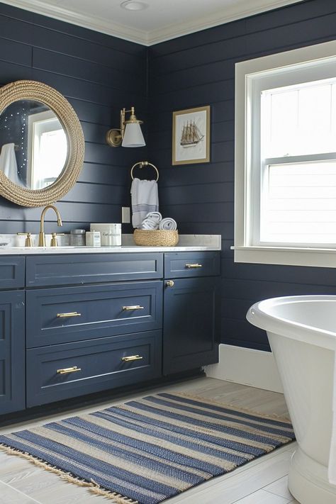 29 Coastal Bathroom Ideas to Inspire Your Next Remodel Coastal Bathroom Mirrors, Beachy Bathroom Decor, Navy And White Bathroom, Coastal Bathroom Ideas, Coastal Bathroom Decor, Beachy Bathroom, Sky House, Nautical Bathroom, Coastal Bathroom