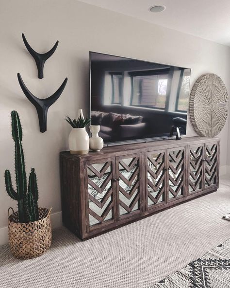 Down Home DeBoers on Instagram: “Basement vibes 🌵” Ranch Glam Home Decor, Boujee Western Decor, Western Style Basement, Western Grunge Living Room, Cactus Home Decor, Western Boho Tv Stand Decor, Western Boho Living Room Tv Stand, Southwestern Living Room Decor, Modern Western Living Room