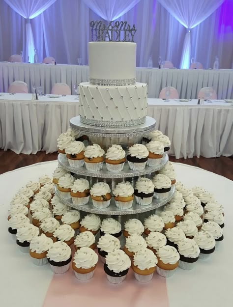 Calumet Bakery Two Tier with custom Cupcake Stand...With Silver Glam Two Tier Cake With Cupcakes, 2 Tier Cake With Cupcakes, Wedding Cake With Cupcakes Display, 2 Tier Wedding Cake With Cupcakes, Cake With Cupcakes Display, Cupcake Display Ideas Wedding, Cupcake Tier Cake, Wedding Cake And Cupcake Display, Cupcake Stands For Weddings