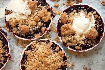 Huckleberry Crisps Recipe | SAVEUR Old School Desserts, Huckleberry Recipes, Sour Cherry Recipes, Fruit Crisp Recipe, Philadelphia Torte, Cherry Crumble, Apple Crumble Recipe, Blueberry Crisp, Fruit Crumble