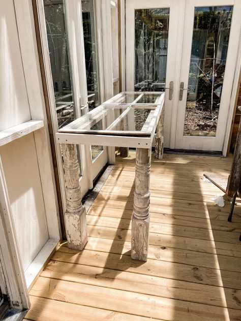 Did you know that we recently built a Greenhouse using reclaimed doors? Well, prior to finding the doors, I had started collecting windows to use for the project. Since we had a supply of windows on hand, we decided to use them to build a potting table for the Greenhouse. This is how we built our Easy DIY Potting Greenhouse Table basically for free. The entire table was built from salvaged and reclaimed materials that were left over from the greenhouse construction. You can see all th… Tables For Greenhouse, Greenhouse Workbench Diy, Window Tables Ideas, Potting Table Ideas, Diy Potting Table, Greenhouse Tables, Potting Area, Professor Plum, Greenhouse Benches