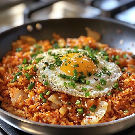 🍚🌶️ Add a tangy, spicy twist to your meals with Kkakdugi Kimchi Bokkeumbap—an irresistible fried rice full of bold flavors! 😍 #KimchiFriedRice #KoreanCuisine Kkakdugi Kimchi Bokkeumbap (Radish Kimchi Fried Rice) Ingredients: Cooked rice (4 cups, preferably day-old) Kkakdugi (radish kimchi, 1 cup, chopped) Kimchi juice (1/4 cup) Soy sauce (2 tbsp) Sesame oil (1 tbsp) Garlic (3 cloves, minced) Green onions (2, chopped) Egg (1, fried, for topping) Sesame seeds (1 tbsp, optional) Instructions:... Fried Rice Ingredients, Kimchi Bokkeumbap, Kimchi Rice, Radish Kimchi, Yams Recipe, Instagram Recipes, Kimchi Fried Rice, Cooked Rice, Rice Ingredients